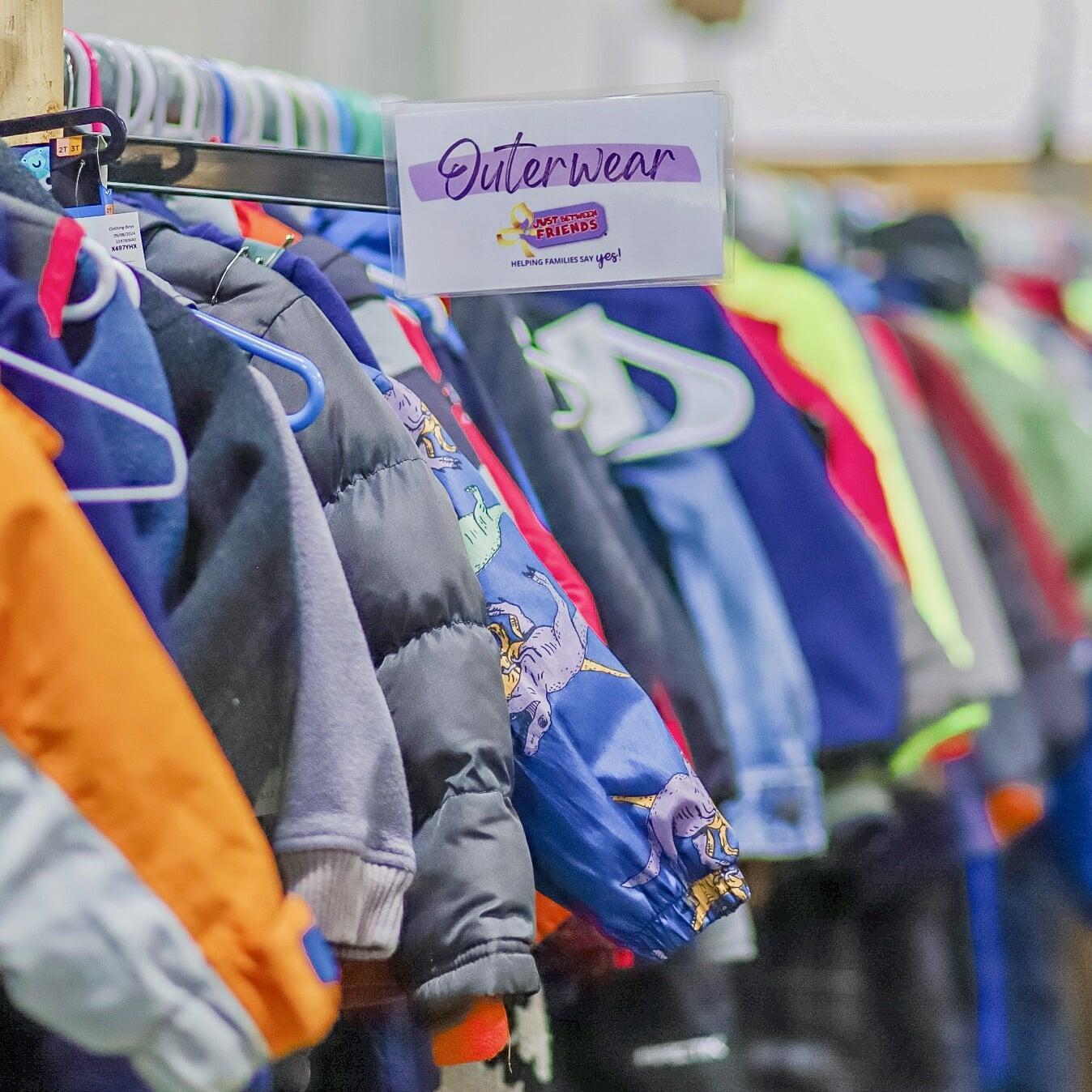A woman shops for clothing at the JBF sale.