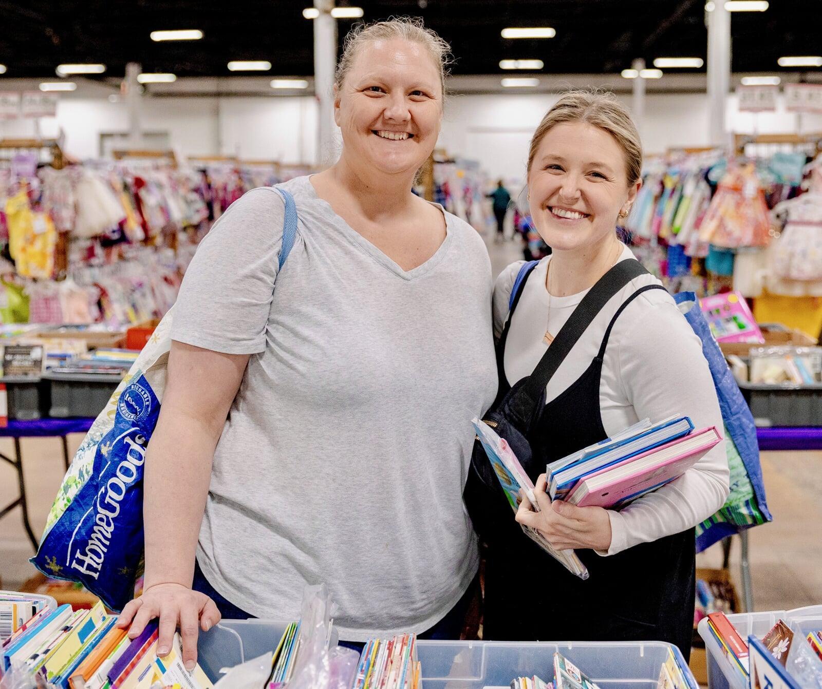 Two woman shopping in the book section.