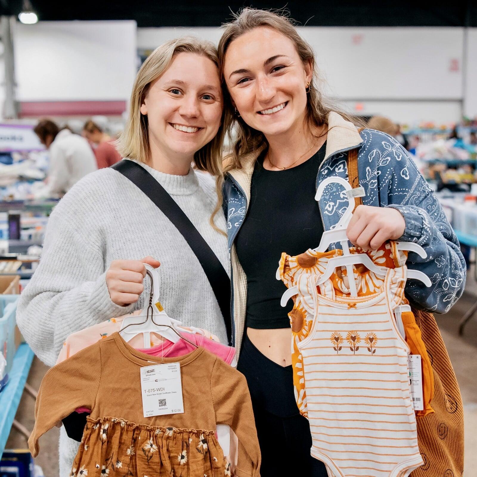 A woman shops for clothing at the JBF sale.